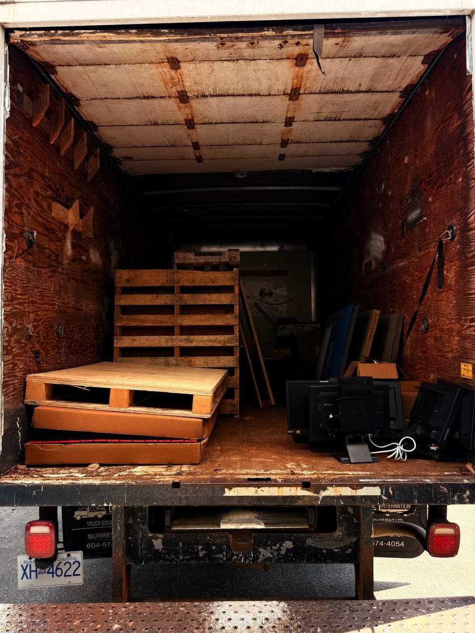 Warehouse cleanout - Stonegate junk removal truck
