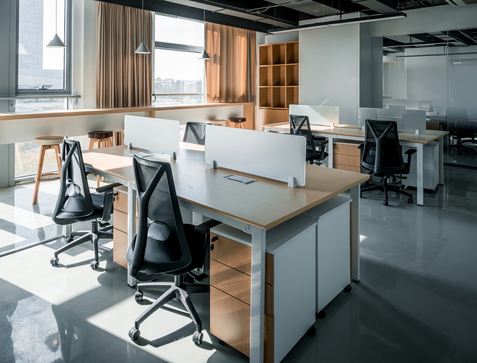 Office desks, chairs and pedestal cabinets ready for an office cleanout