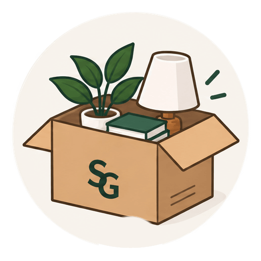 A Stonegate box unpacked at the new home with a plant, books and a lamp